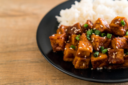 stir fried tofu with spicy sauce - healthy and vegan food styleの写真素材