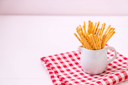 biscuit sticks on wood background