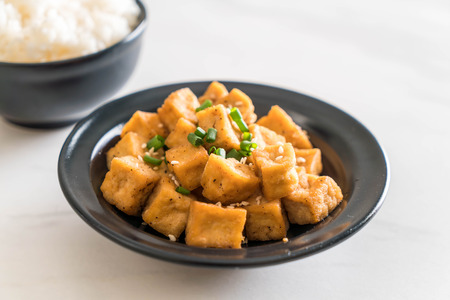Fried Tofu in a bowl with sesame - healthy and vegan food styleの写真素材