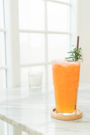 iced fruit punch glass in cafeの写真素材