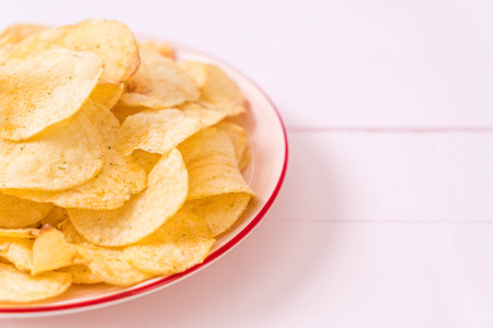 potato chips on plate - unhealthy foodの写真素材