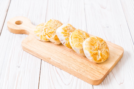 Homemade apple pie in asian style on wood background