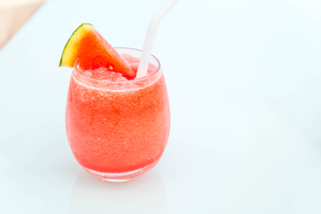 watermelon smoothies with sea backgroundの写真素材