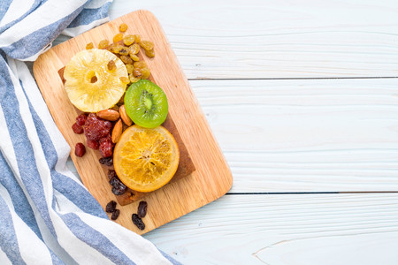 fruit cake on wood backgroundの写真素材