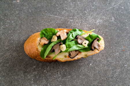 bread with rocket and shiitake mushroom - healthy or vegan food styleの写真素材