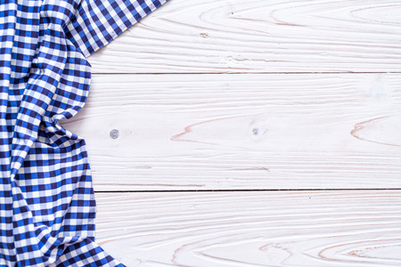 kitchen cloth (napkin) on wood background with copy spaceの写真素材