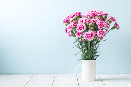 pink spring flower on wooden background with copy spaceの写真素材