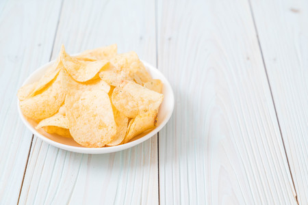 potato chips on plate - unhealthy foodの写真素材