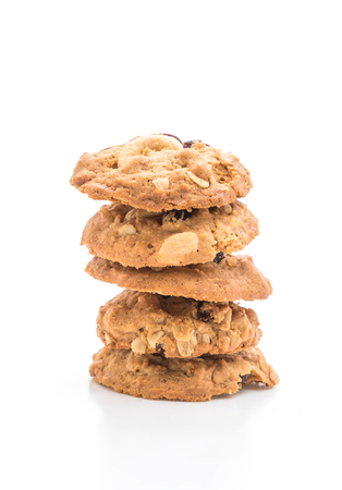 cookies with raisin and roasted cashew nuts isolated on white backgroundの写真素材