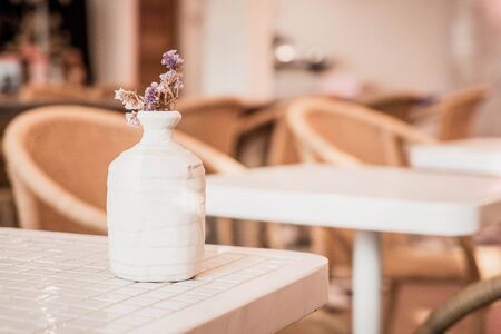 flower in vase decoration on table - vintage filterの写真素材