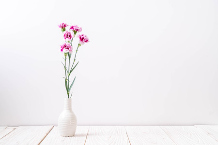 Pink spring flower on wooden background with copy spaceの写真素材