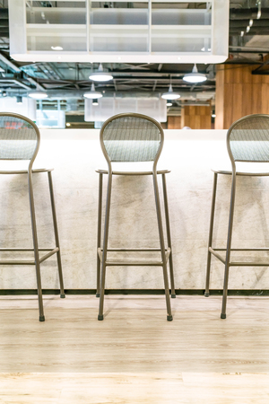 empty chair on bar in cafeの写真素材
