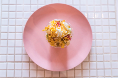 yoghurt ice cream in cup with fruit