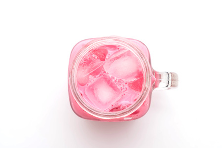 pink strawberry milkshake isolated on white backgroundの写真素材