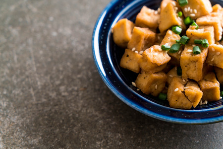 Fried Tofu in a bowl with sesame - healthy and vegan food styleの写真素材