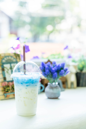 butterfly pea juice with milk in cafeの写真素材