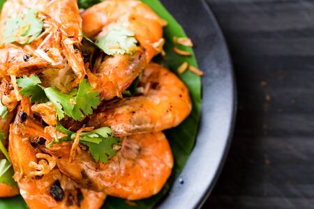 fried shrimp with garlic and vegetableの写真素材