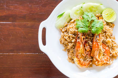 fried rice with shrimp paste on plateの写真素材