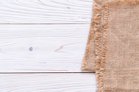 kitchen cloth (napkin) on wood background with copy space