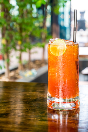 iced lemon tea on wood tableの写真素材