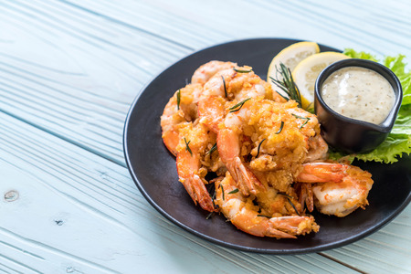 fried shrimps or prawns with sauceの写真素材