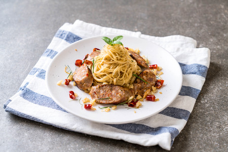 Stir-Fried Spaghetti with Sai Aua (Notrhern Thai Spicy Sausage) - Fusion food styleの写真素材