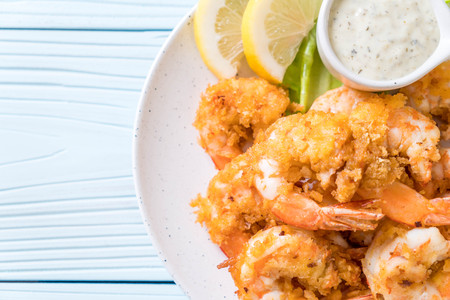 fried shrimps or prawns with sauceの写真素材