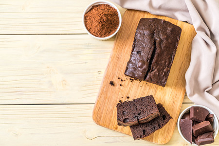 chocolate brownie cake on wood backgroundの写真素材