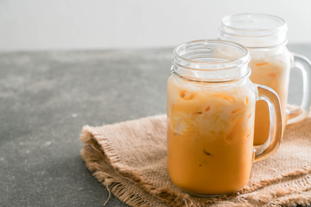 iced thai milk tea in glassの写真素材