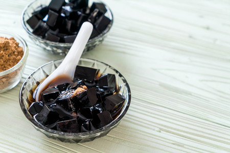 black grass jelly in bowlの写真素材
