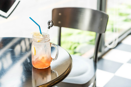raspberry and lemon soda glass in cafe