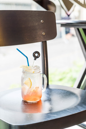 raspberry and lemon soda glass in cafeの写真素材