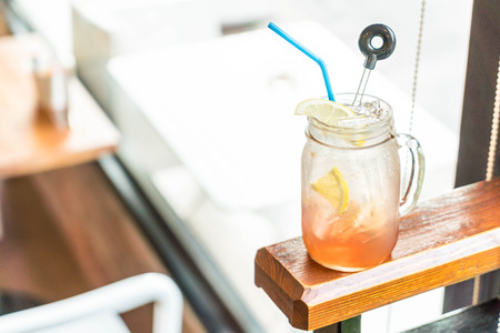 raspberry and lemon soda glass in cafeの写真素材