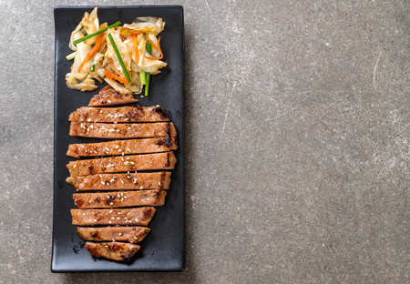 grilled sliced pork steak with vegetable - Asian Styleの写真素材