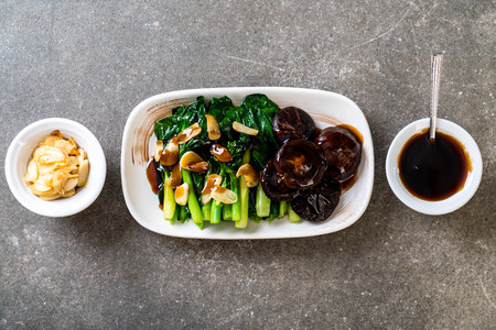 Hong Kong Kale stir fried in oyster sauce with garlicの写真素材