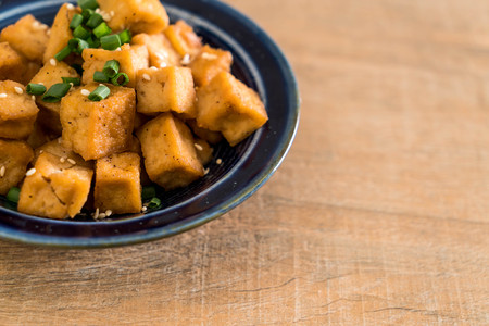 Fried Tofu in a bowl with sesame - healthy and vegan food styleの写真素材