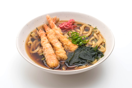udon ramen noodles with shrimps tempura isolated on white backgroundの写真素材