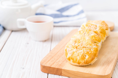Homemade apple pie in asian style on wood backgroundの写真素材