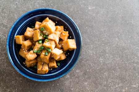 Fried Tofu in a bowl with sesame - healthy and vegan food styleの写真素材
