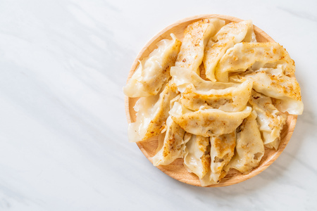 Japanese gyoza or dumplings snack with soy sauceの写真素材