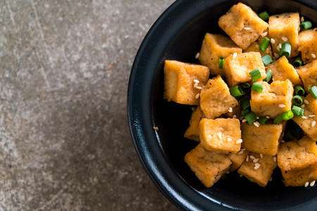Fried Tofu in a bowl with sesame - healthy and vegan food styleの写真素材