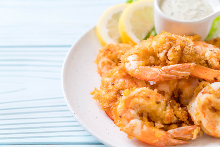 fried shrimps or prawns with sauceの写真素材