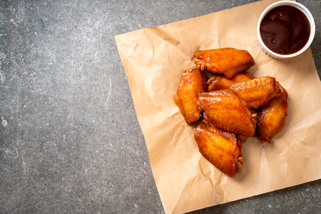 barbecue chicken wings with sauceの写真素材