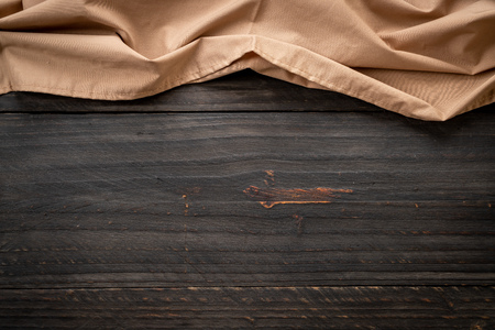kitchen cloth (napkin) on wood background - vintage effect filterの写真素材