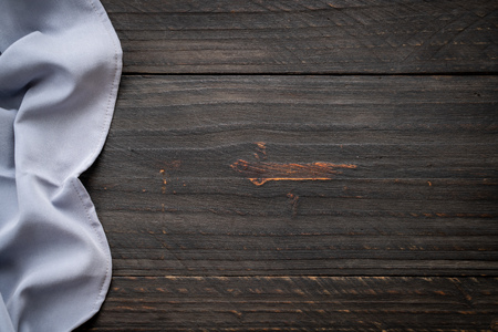kitchen cloth (napkin) on wood background - vintage effect filterの写真素材