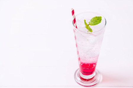 iced strawberry soda on wood tableの写真素材