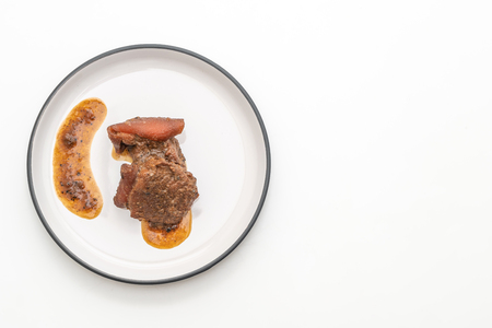pork stew with herb isolated on white backgroundの写真素材