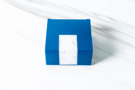 packaging paper box on marble backgroundの写真素材