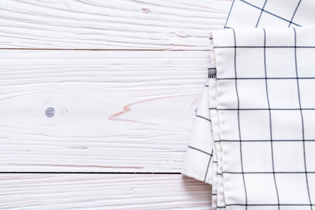 kitchen cloth (napkin) on wood background with copy spaceの写真素材