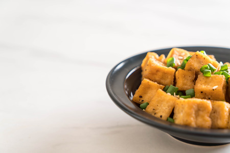 Fried Tofu in a bowl with sesame - healthy and vegan food styleの写真素材